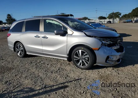 2022 Honda Odyssey Touring from USA, damaged, VIN 5FNRL6H86NB056268
